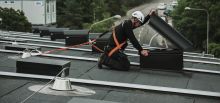 Securope fall arrest for the maintenance of a hot deck roof - Stockholm, Sweden